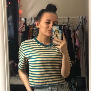 a multicoloured cropped stripped shirt